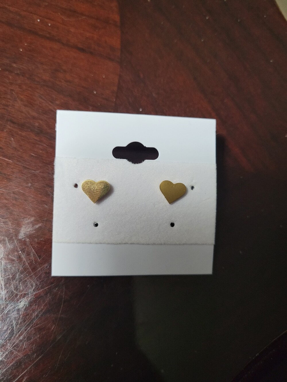 Acero Heart Shaped Gold Colored Stainless Steel earrings.